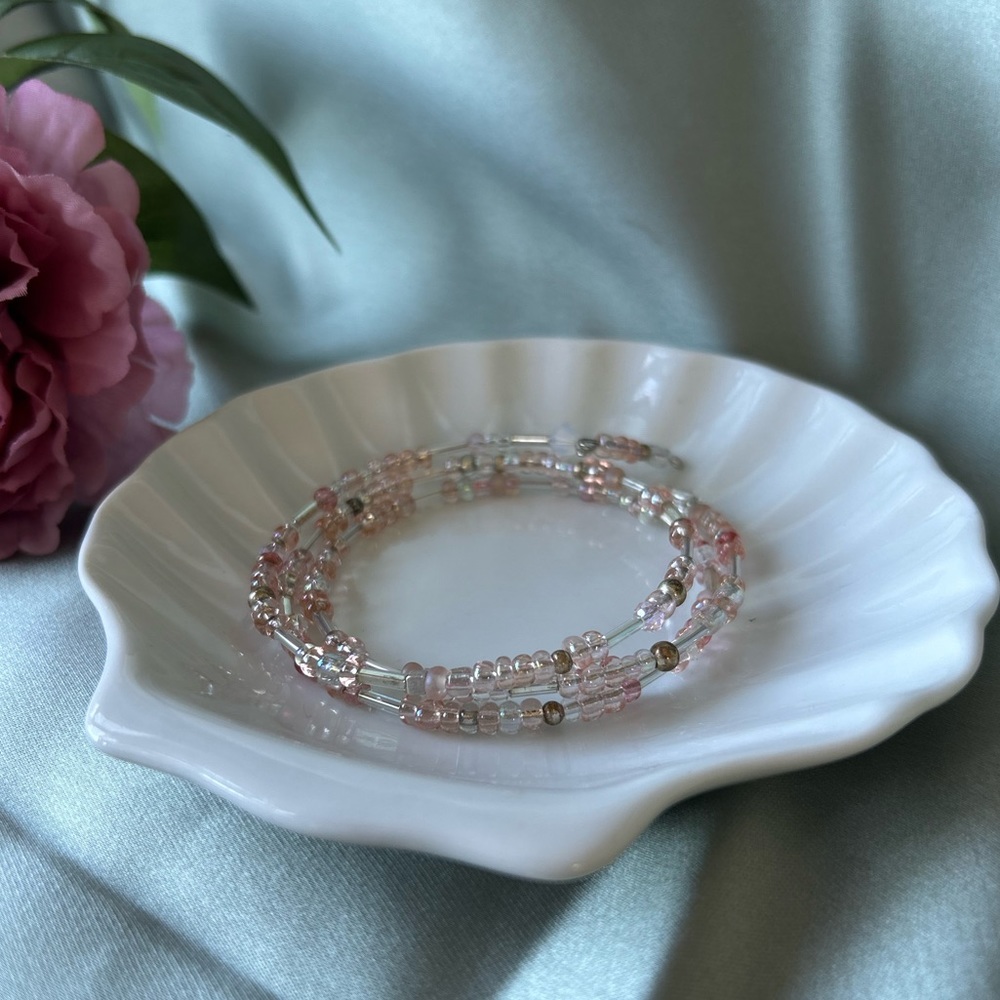Handcrafted memory wire beaded bracelet in shades of pink & silver.
